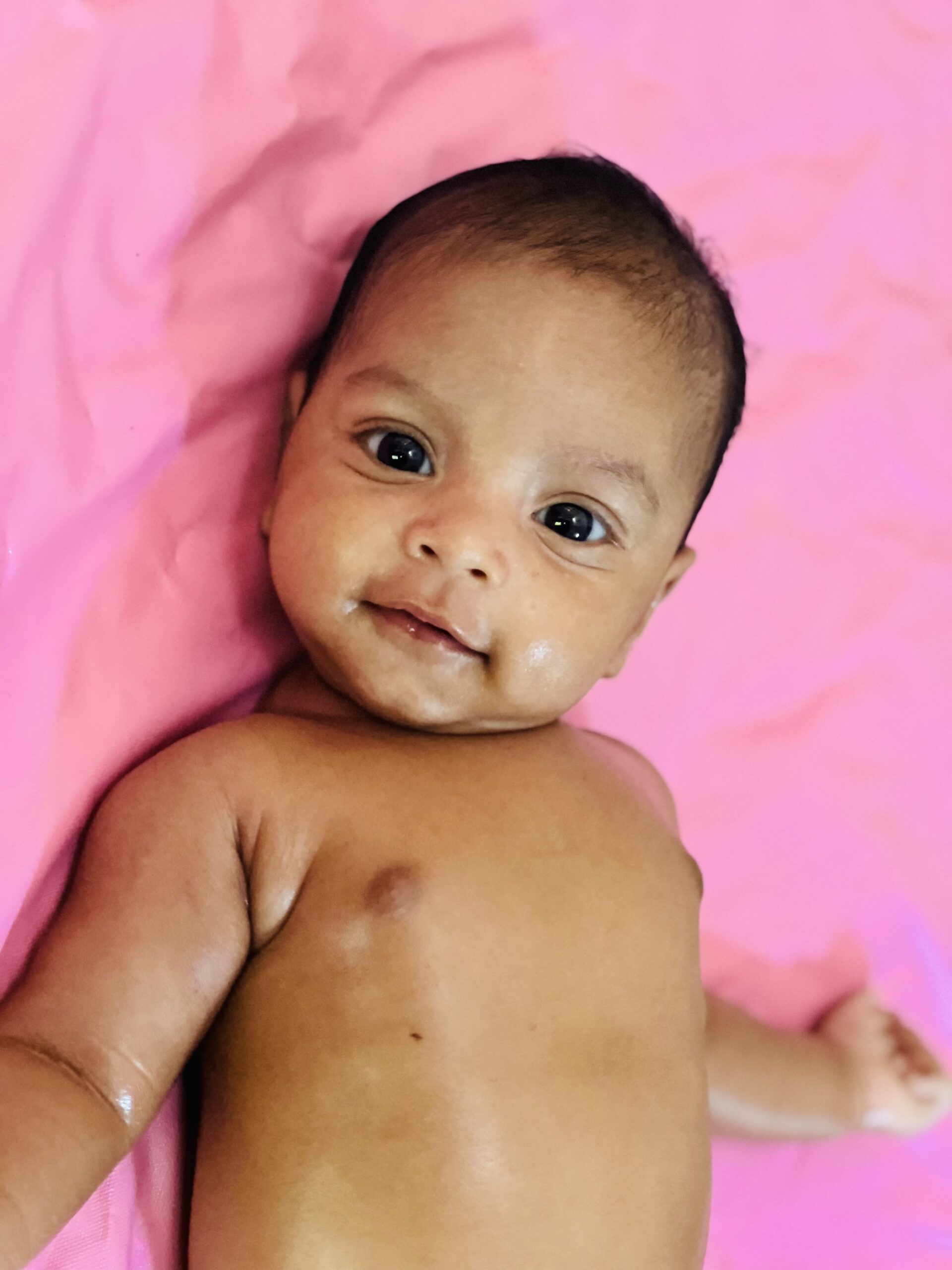 Baby on pink seet
baby photography in kerala
new born baby photography